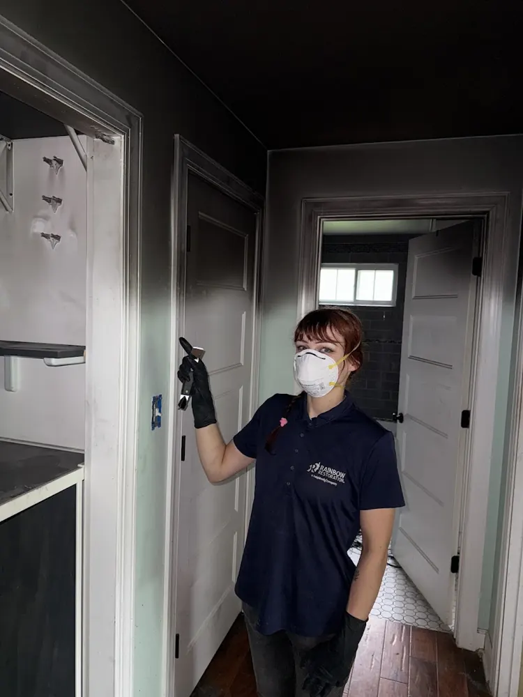 Trinity Water & Fire Restoration technician in protective gear on a job in Dallas